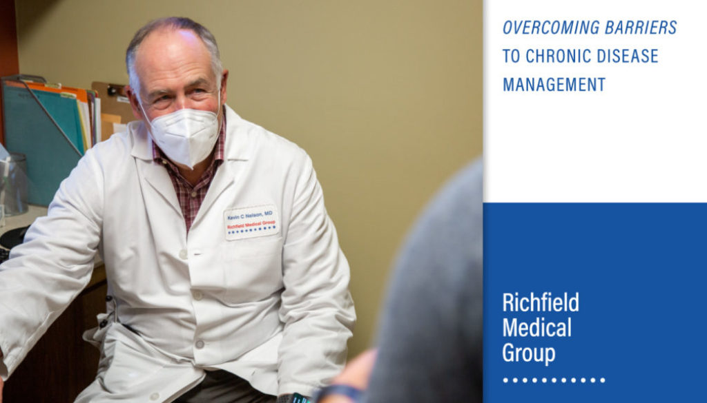 Doctor sitting with patient, "Overcoming Barriers to Chronic Disease Management" by Richfield Medical Group