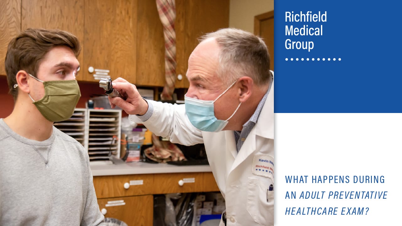 Richfield medical group presents " What Happens During An Adult Preventative Healthcare Exam?" featuring image of a doctor examining an adult male patient's eyes at a routine physical appointment