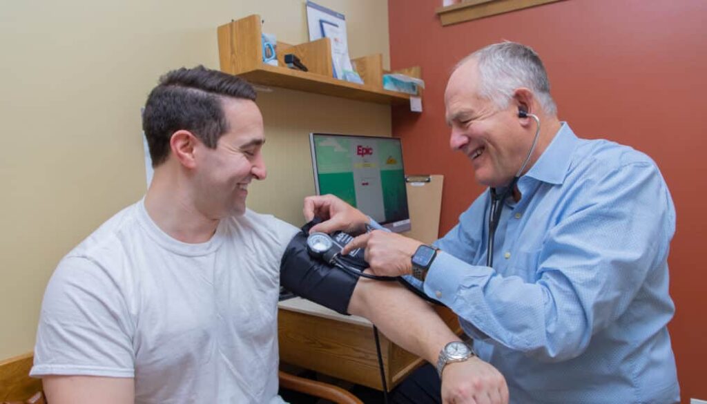 Man getting blood pressure done