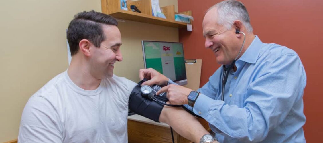 Man getting blood pressure done